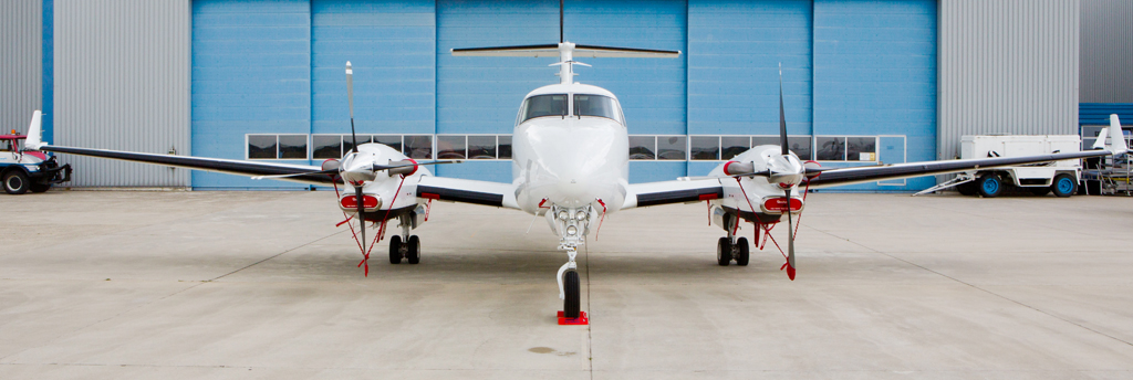 Flight Inspection Aircraft of type King Air in front of the Aerodata hangar